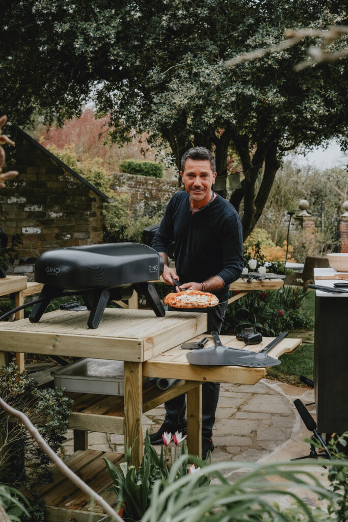 Gino De'Campo cooking Pizza at Bents Garden and Home